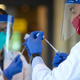 Pharmacists prepare doses of the covid-19 vaccine at the Life Care Center of Kirkland, Washington, an early epicenter of the coronavirus outbreak in the U.S.